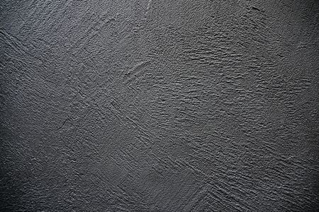 Dark stone background. Texture. Natural light. Close-up.の写真素材