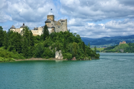 View of medieval castle in Niedzica against cloudy sky, Poland のeditorial素材
