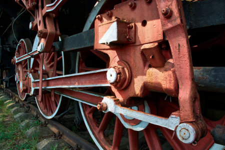 Close-up of wheels of old steam locomotive, Poland
