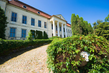 DROGOSZE, POLAND - JULY 21, 2018: Baroque style palace in Drogosze, Poland (former Donhoffstadt, East Prussia). Built in 1710-1714, belonged to aristocratic Prussian family von Donhoffのeditorial素材