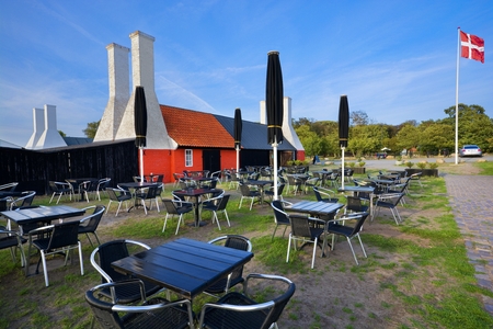 Old traditional smokehouses with characteristic chimneys in Hasle, Bornholm, Denmark. This is the place, where you can taste the most popular dish on the island - Sol over Gudhjemのeditorial素材