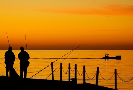 Two men fishingの写真素材