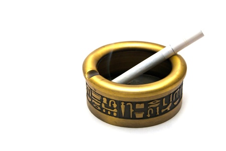 Egyptian ashtray with cigaretteの写真素材