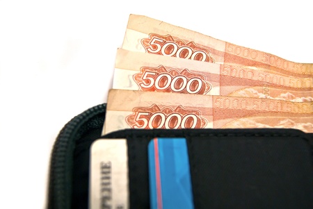 Three banknotes in wallet on whiteの写真素材