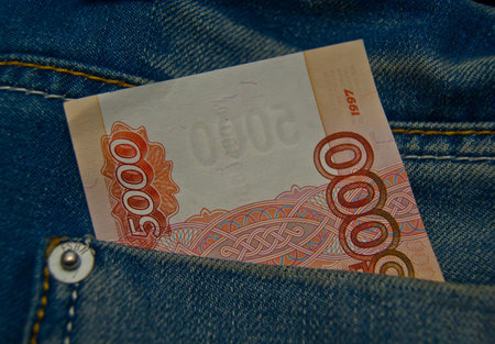 Five thousand rubles in a blue jeans pocket 
