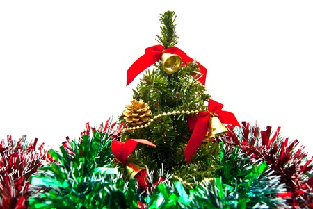 Christmas tree and tinsel on whiteの写真素材