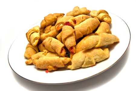 Sugar croissants on plate. On white backgroundの写真素材