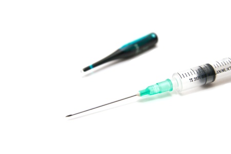 Syringe and ampoule on white backgroundの写真素材