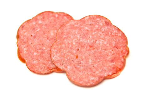 two slices of cervelat on whiteの写真素材