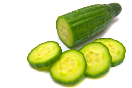 fresh cucumber close-up on white backgroundの写真素材