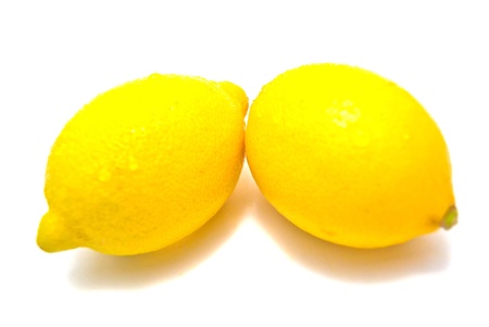 Two fresh lemons on whiteの写真素材