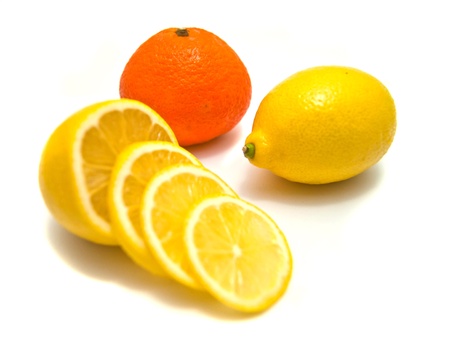 lemon and tangerine close-up on white backgroundの写真素材