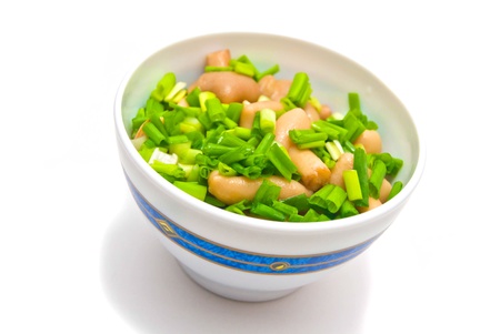 marinated butter mushrooms with onions on plateの写真素材