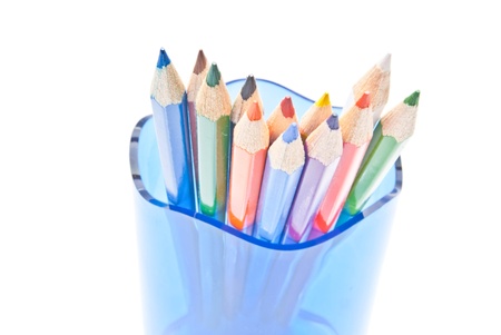 colorful pencils in glass on white background close-upの写真素材