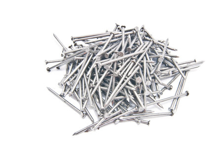 set of silver nails on whiteの写真素材