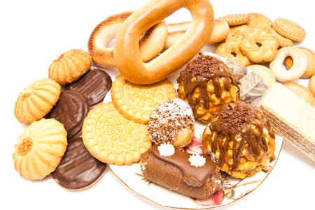 many different sweets closeup on white background