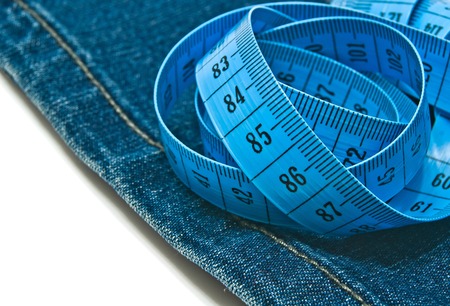 blue meter and denim closeup on white backgroundの写真素材