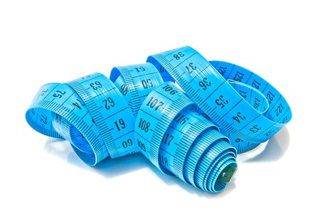 measuring tape for needlework closeup on white backgroundの写真素材