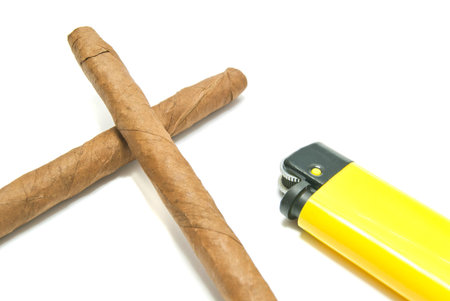 two cigars and yellow plastic lighter on white background