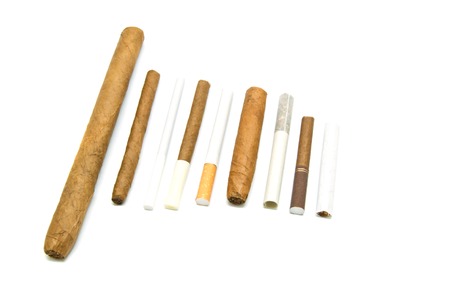 many different cigarettes and cigars on white backgroundの写真素材