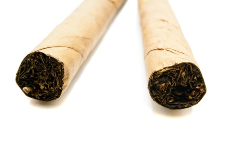 pair of Cuban cigars on white backgroundの写真素材