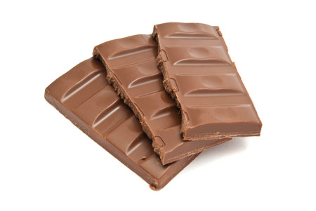 three slices of chocolate on white background