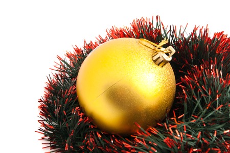 christmas tree toy and tinsel on whiteの写真素材