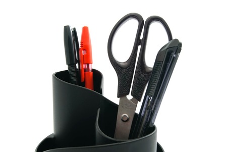 pens and other office stationery on white closeupの写真素材