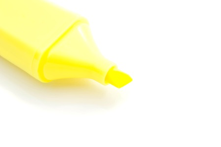plastic yellow marker closeup on white backgroundの写真素材