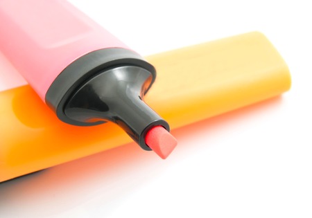 pair of plastic markers on white background closeupの写真素材