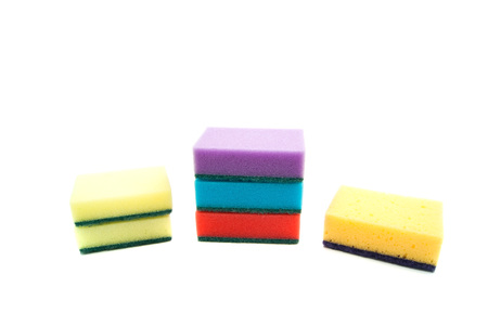different colored sponges on white background closeupの写真素材
