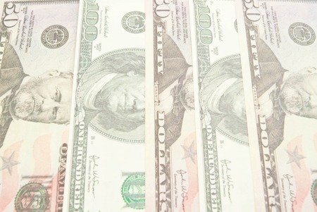 background of some banknotes of different dollarsの写真素材