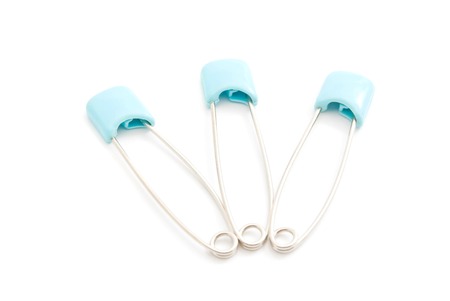 three blue linens clips on white backgroundの写真素材