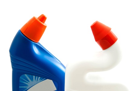 blue and white bottles of detergent on white backgroundの写真素材
