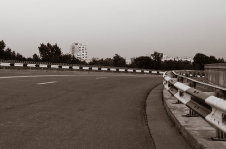 empty racing track in good weather black and white
