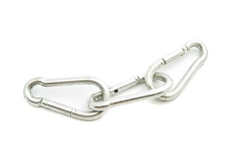 three metal carabiner on white background closeupの写真素材