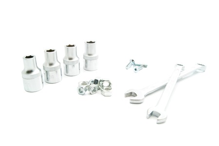 wrenches, heads and screws on white backgroundの写真素材