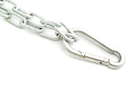 chain with carabiner on white background closeup