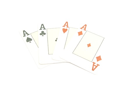 four unsuited aces closeup on white backgroundの写真素材