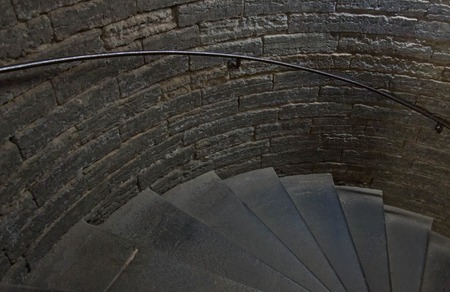 stone staircase in an old brick buildingの写真素材