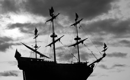 sailboat against the sky black and whiteの写真素材