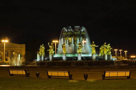 Fountain with beautiful sculptures at summer nightの写真素材