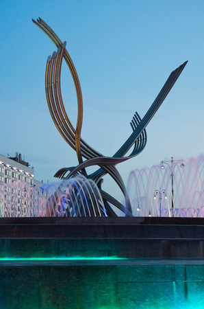 beautiful fountain in the evening city parkの写真素材