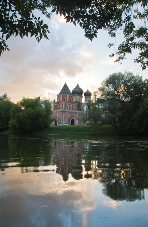 view of old brick tower in summerの写真素材