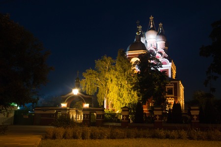 old red stone church in night parkの写真素材