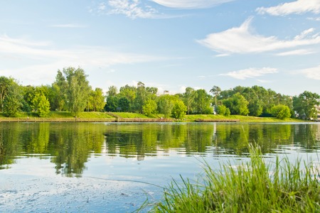 clouds over the lake on summer dayの写真素材