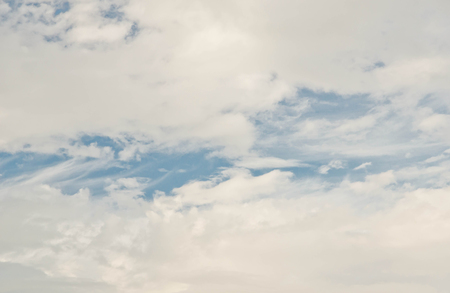 a lot of white clouds in the blue skyの写真素材