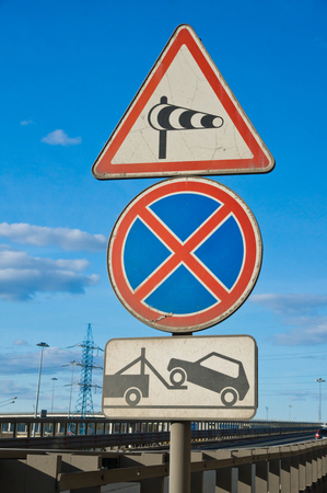 Several road signs on the highway in the cityの写真素材