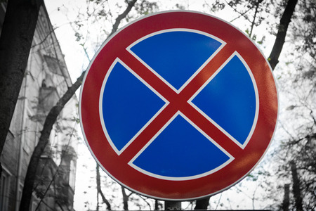 road sign "No parking" near the houseの写真素材