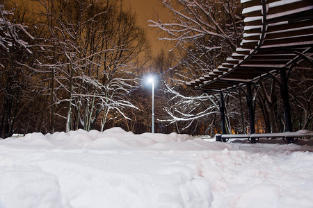 street light and drifts in the evening in the winterの写真素材